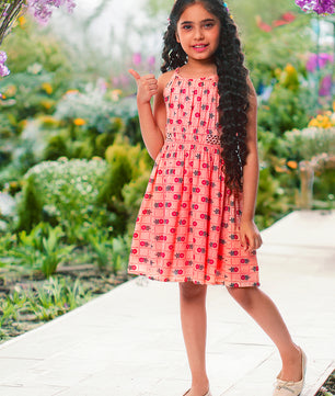 Girls Printed Cotton Dress in Peach Color